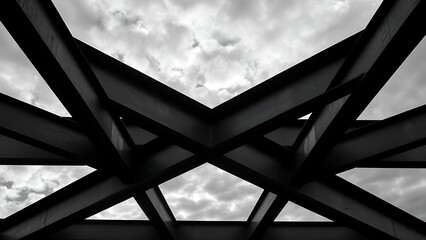 Steel beams forming geometric patterns against a cloudy sky, emphasizing industrial design.