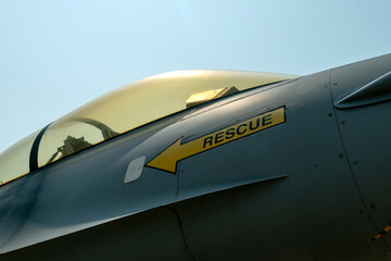 A Rescue emergency sign sticker on a fighter jet