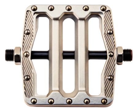 Silver metal platform bicycle pedal with removable grip pins on a transparent background