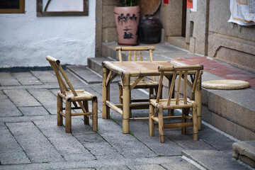 Rustic Bamboo Table and Chairs in a Traditional Courtyard