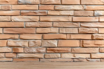 Close-up of a textured brick wall surface with warm reddish-brown and beige tones showing detailed mortar joints and natural stone pattern