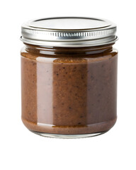 Jar of homemade apple butter preserves sits ready to be spread on toast or biscuits