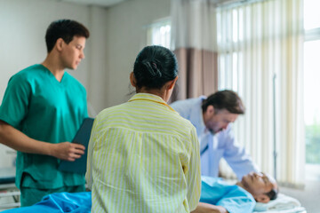 Obraz premium Family Visit in Hospital Room