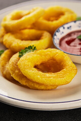 Colmar rings fried food fries fast food crispy appetizer fresh delicious gourmet food background on the table rustic food top view copy space