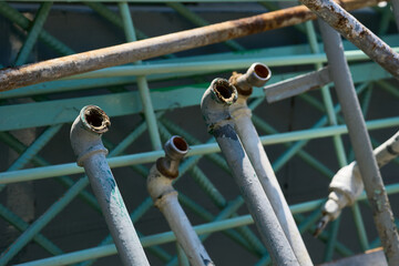  Old water tube pipe,rusty faucet.A pile of scrap iron