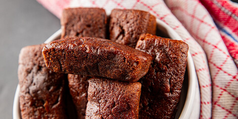 Financier biscuit chocolate cookie sweet dessert fresh delicious gourmet food background on the...