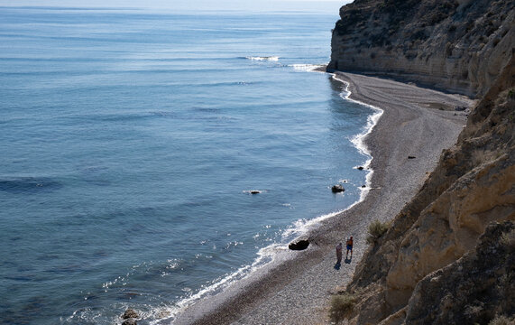Tourists admiring beautiful seascape from pissouri bay beach LImassol Cyprus