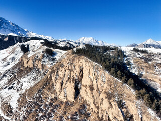 The Magnificent Scenery of Snowy Mountains and Canyons