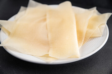 brik dough thin sheet raw packaging dough phyllo fresh delicious gourmet food background on the table rustic food top view copy space