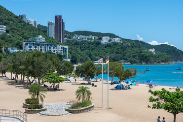 Obraz premium Hong Kong Island, Repulse Bay Beach, sunny day, clear sky and seascape. Hong Kong, China - 18 May 2025
