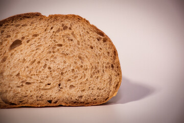 A Slice of Freshly Baked Whole Wheat Bread with a Soft and Porous Texture