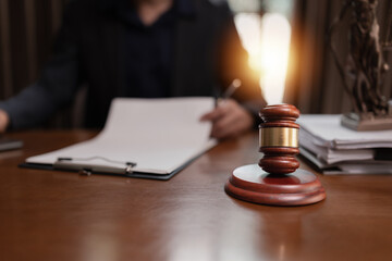 Lawyer Businesswoman Working with Documents and Signing Contract at Office Desk.