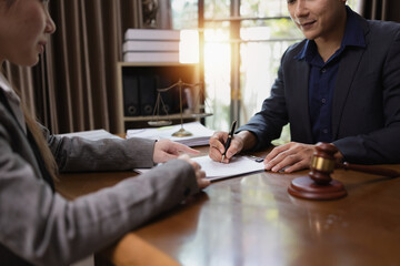 Two Lawyer with Document Paper and Hammer on Wood table,  Judge's Gavel, Law, Justice Symbol,...