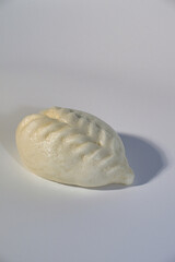 A Delicious Steamed Bun with a Unique Shape and Smooth Texture
