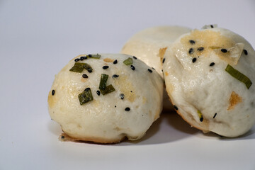 Delicious Steamed Buns with Scallions and Sesame Seeds