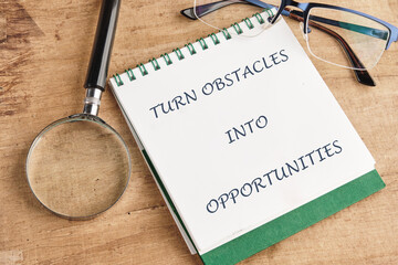 Motivational quote TURN OBSTACLES INTO OPPORTUNITIES