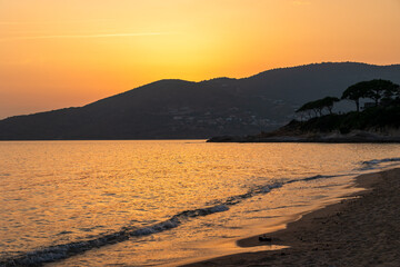 Sunset over the beach and hills of Sagone, France, Corsica, Sagone, 14 June 2025