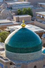 Aerial view of turquoise dome of Pahlavon Mahmud Complex in Khiva, Uzbekistan