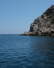 Fototapeta premium Rocky Turkish Coast Viewed from Sea Tour Boat 