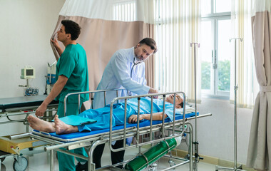  Doctor Examining Patient in Emergency Room