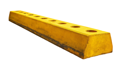 Yellow concrete parking stop with round holes on a transparent background.