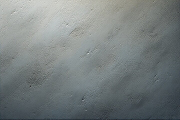Grey textured concrete wall background with gradient light.