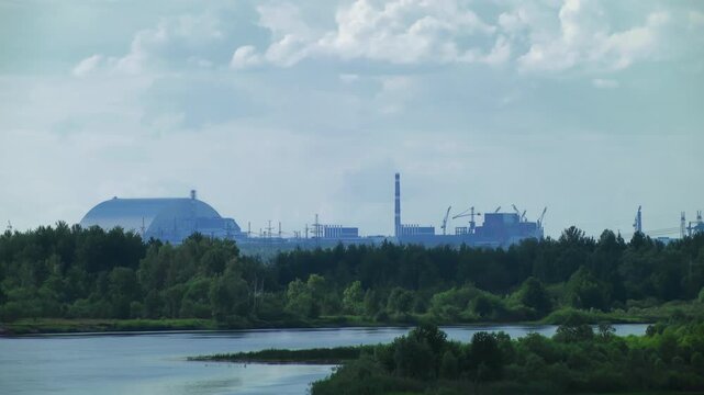 landscape of Chernobyl exclusion zone with Chernobyl NPP. View from Pripyat rive. Ukraine