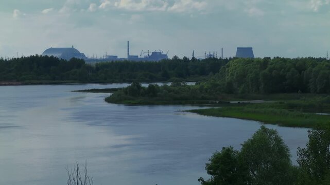 View from Pripyat rive. Chernobyl new safe confinement arch. Ukraine
