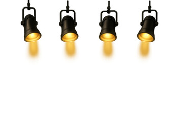 Obraz premium Four hanging spotlights illuminating transparent background