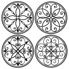 Four symmetrical, ornate circular designs illustration vector