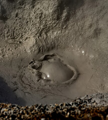 Russia. Kuril Islands. Bizarre mud bubbles bubbling fumaroles at the foot of the dormant volcano Baranovsky on the island of Iturup.