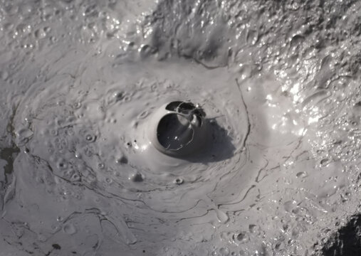 Russia. Kuril Islands. Bizarre mud bubbles bubbling fumaroles at the foot of the dormant volcano Baranovsky on the island of Iturup.