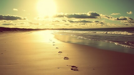 Serene sunset over a pristine beach, footprints in the sand leading towards a gentle ocean wave under a cloudy sky