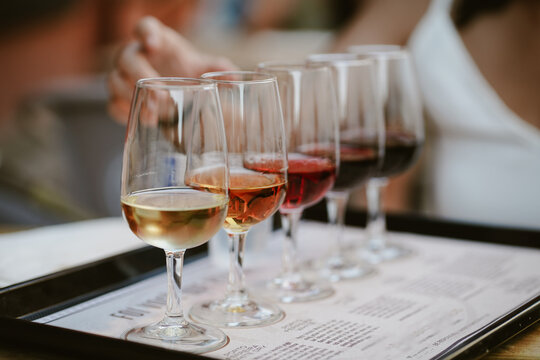 port wine tasting with five glasses on a table in gaia/ porto, portugal