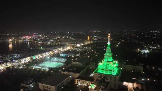 May 20,2025, VinUniversity campus in Hanoi, Vietnam. Aerial night view of, captured the scene highlights the iconic main building illuminated in vibrant lights