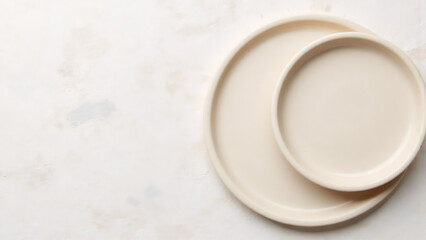 Elegant Beige Plates on Textured Surface: Minimalist Dining and Tableware Photography