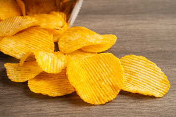 Potato chips , delicious BBQ seasoning spicy for crips, thin slice deep fried snack fast food.