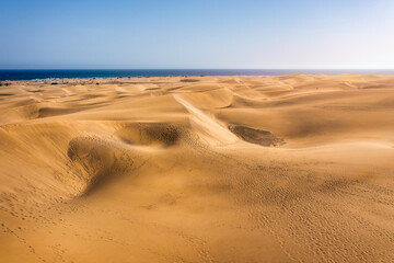 View of the Natural Reserve of Dunes of Maspalomas, in Gran Canaria, Canary Islands, Spain. Beautiful view of Maspalomas Dunes on Gran Canaria, Canary Islands, Spain.