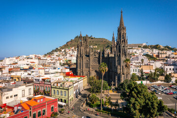 Aerial view of the Parroquia de San Juan Bautista de Arucas church in Arucas town, Gran Canaria, Canary Islands, Spain. Historic Neo-Gothic cathedral in Arucas.