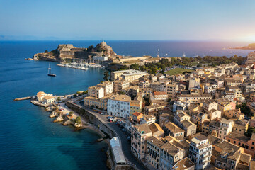 Panoramic view of Kerkyra, capital of Corfu island, Greece. Aerial drone view of Kerkyra with beautiful buildings during summer sunny day. Corfu island, Greece.