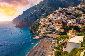 View of Positano with comfortable beach and blue sea on Amalfi Coast in Campania, Italy. Positano...