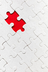 White jigsaw puzzle pieces. Fill in pieces of the jigsaw puzzle. Complete the jigsaw puzzle with...