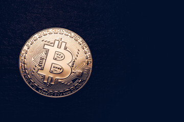 Crypto currency golden coin with bitcoin symbol on isolated on black background. Bitcoin Coin on black background. Bitcoin cryptocurrency. Cryptocurrency Coin Concept.