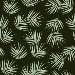 Seamless tropical pattern with palm leaves on a dark background. Minimalistic botanical print in calm green tones. Suitable for textiles, packaging, wallpaper, wrapping paper, and decorative projects.