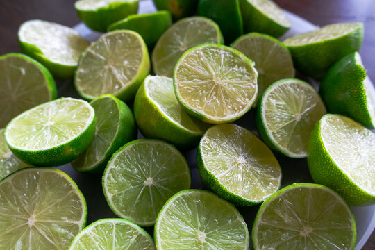 Halved Fresh Limes on Kitchen Surface
