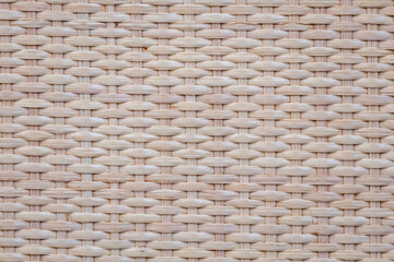 A woven pattern of wood with a light brown color