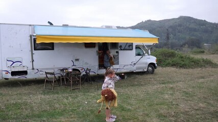 Celebrating the birthday of a little daughter in a mobile home