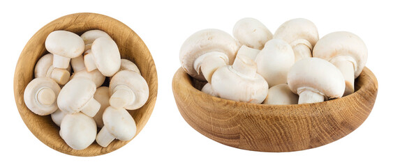 Fresh mushroom champignon in a wooden bowl isolated on white background. Top view. Flat lay