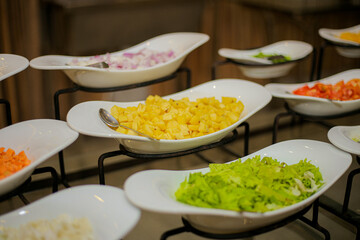 Pineapple salad and leaf salad on table