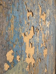old peeling paint on the wall,  background of an old wall with peeling paint